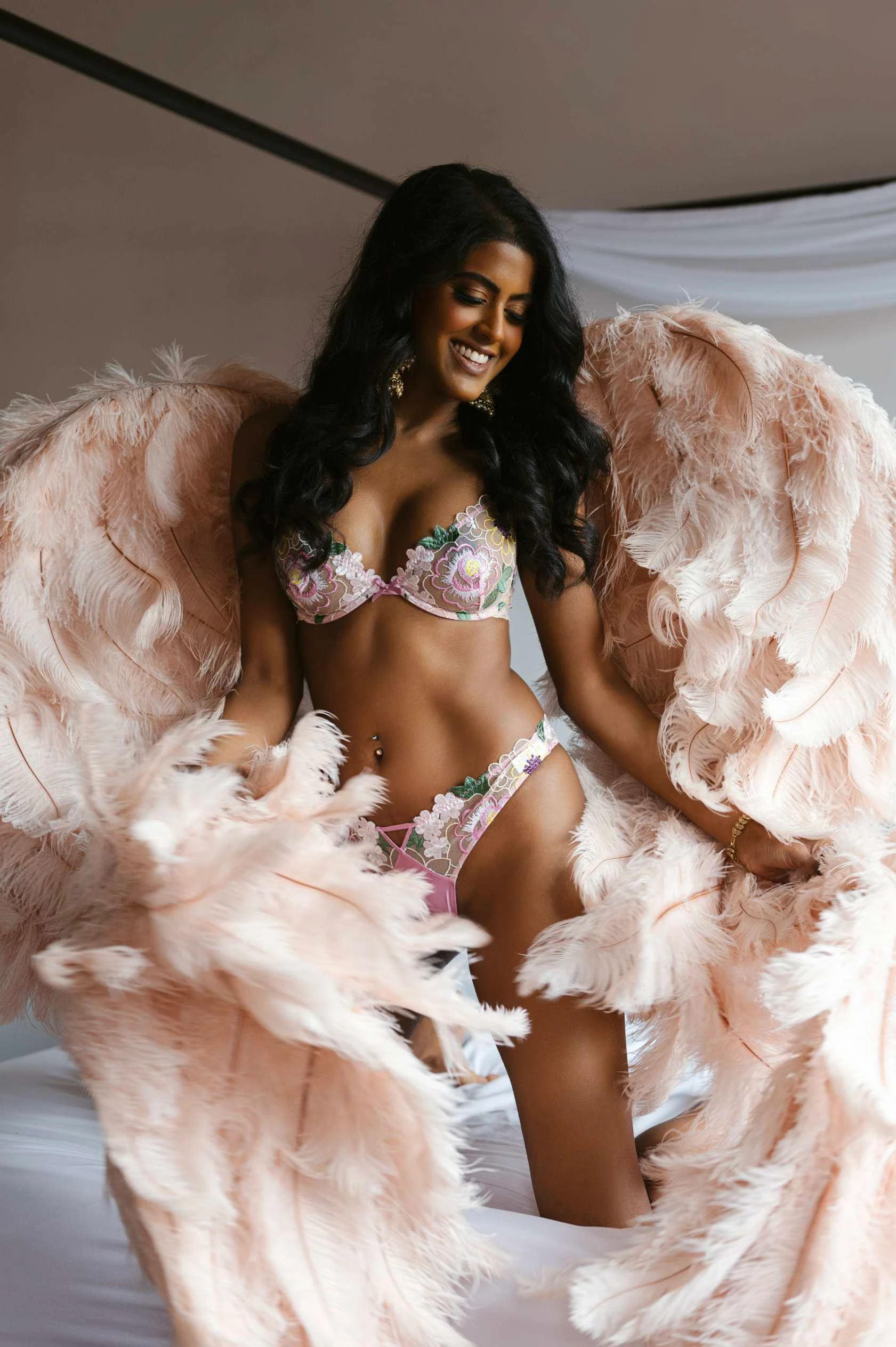 angel wings boudoir photoshoot with boudoir photographer in portland, oregon